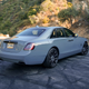 The rear end of the 2023 Rolls-Royce Black Badge Ghost